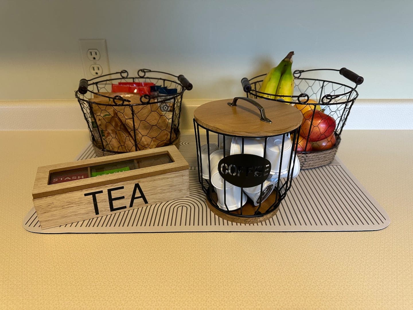 Breakfast basket with tea, coffee and fresh fruit